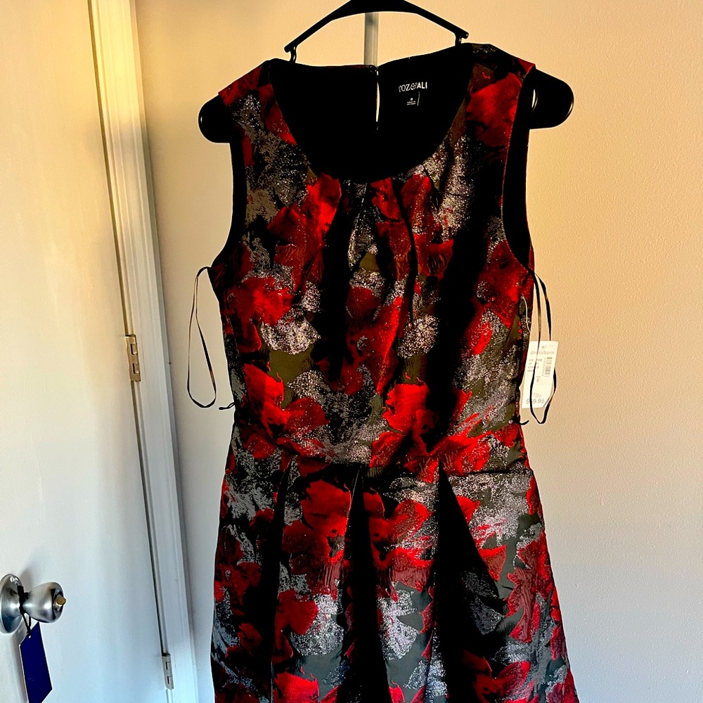 Brand new knee length party dress black for sale